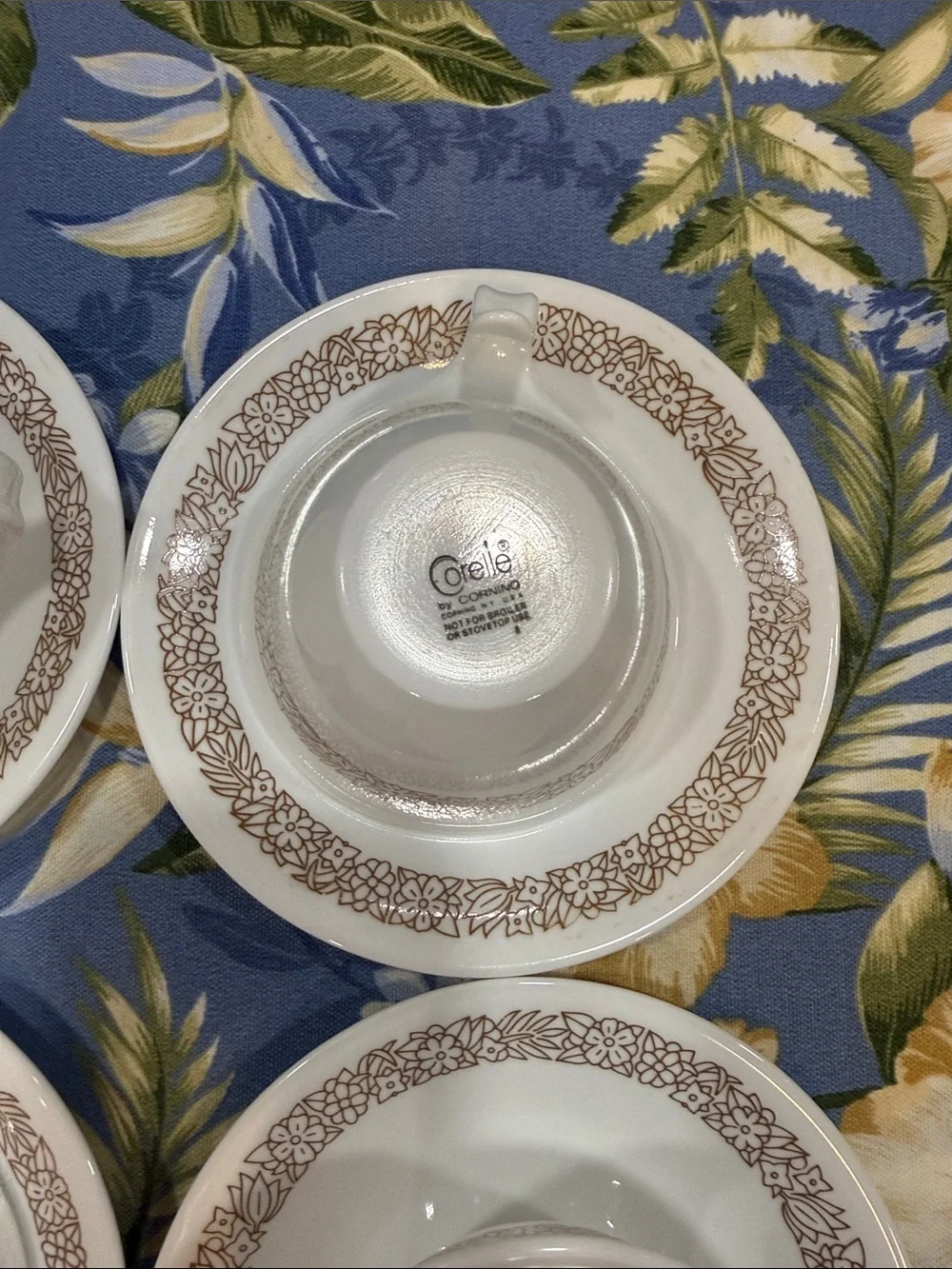 Corelle set of four cups and saucers Woodland design.
